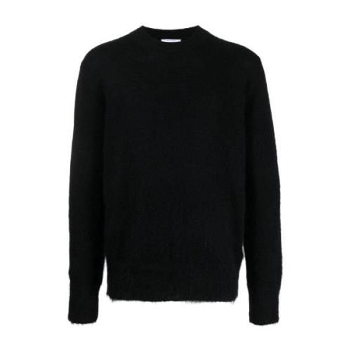 Sort sweater med hvide pile