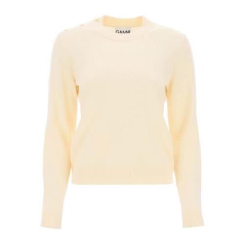 Sweater i merinould og cashmere med sommerfugleknapper