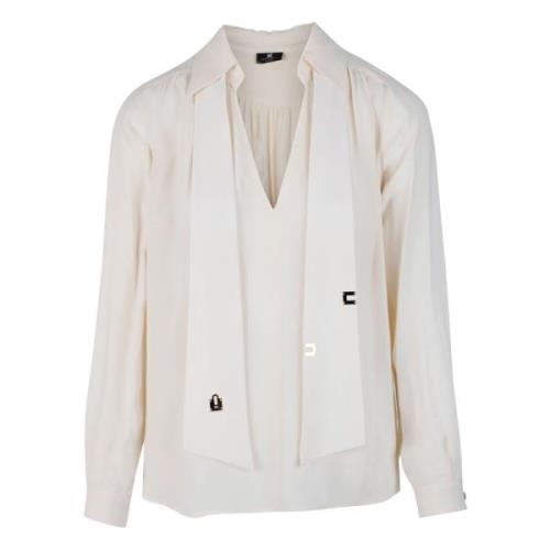 Elegant cremefarvet bluse med V-hals og kravedetaljer