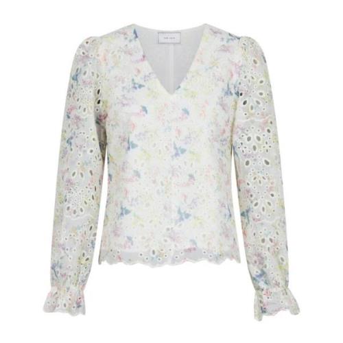 Bluse med broderi og blomsterprint