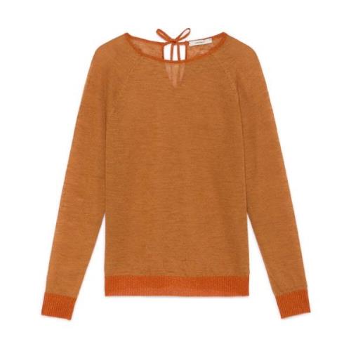 Linned sweater med blonder detaljer