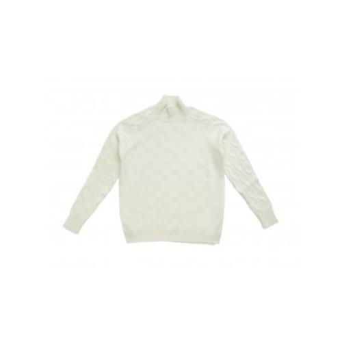 Ribbet højhalset sweater i beige