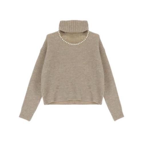 Stilfuld højhalset sweater